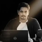 Digital marketing freelancer in Dubai improving brand visibility online image showing creator working in table
